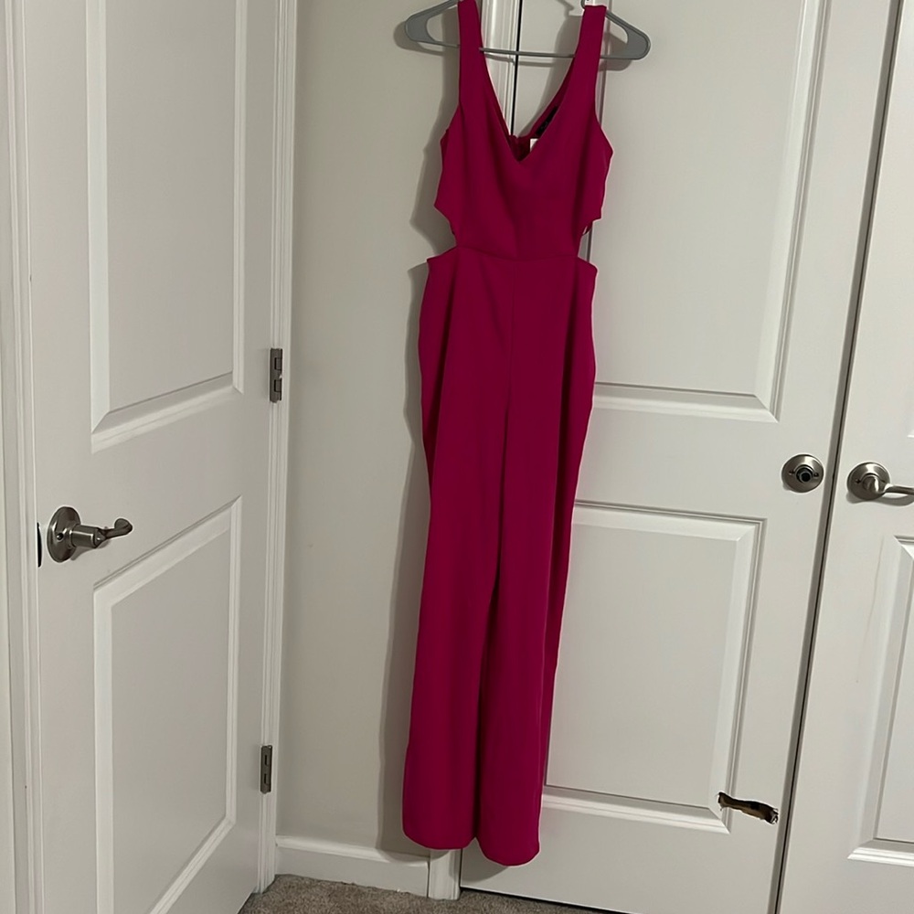 Crystal sky pink cut out jumpsuit size medium